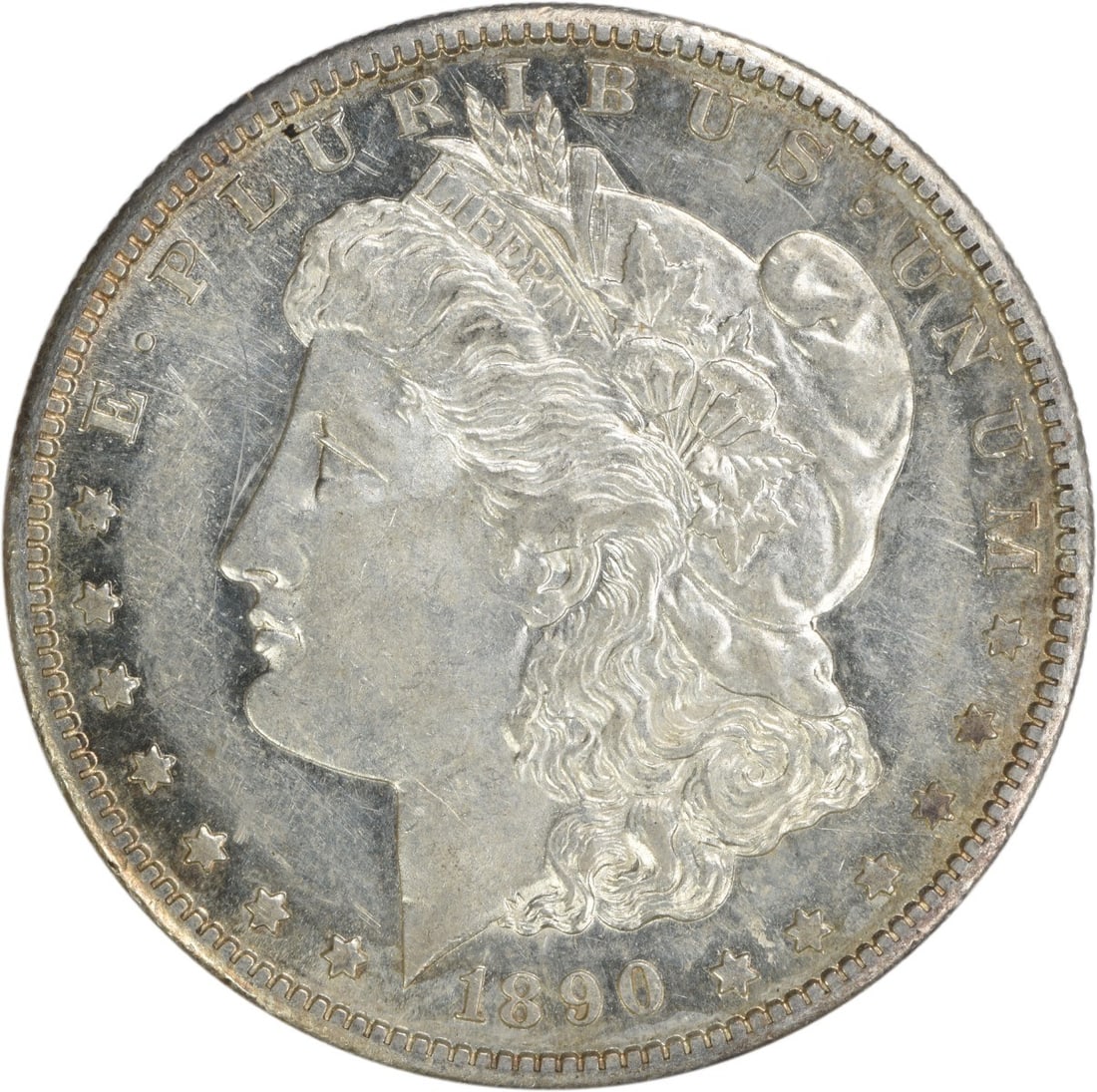 1890-S Morgan Silver Dollar AU Uncertified Coin by George T. Morgan: 1890-S Morgan Silver Dollar AU Uncertified Coin by George T. Morgan This 1890-S Morgan Silver Dollar showcases a beautiful design by George T. Morgan. The coin has a composition of 90% silver and 10% 