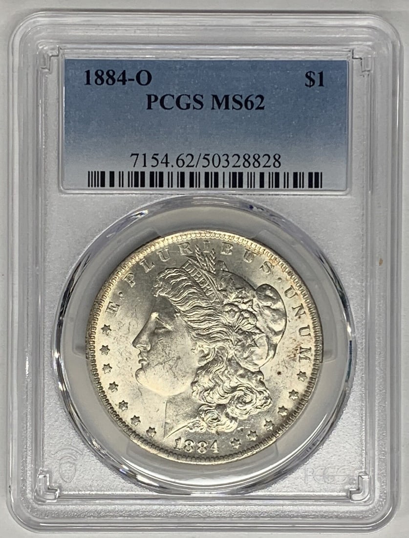 PCGS MS 62 Graded 1884-O Morgan Dollar Silver Coin: PCGS MS 62 Graded 1884-O Morgan Dollar Silver Coin This 1884-O Morgan Silver Dollar is an uncirculated coin graded MS 62 by PCGS. Struck in silver, it originates from the United States and features th