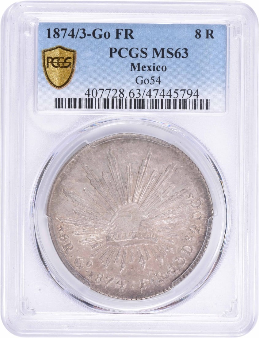 1874/3 Go FR Mexico 8 Reales Coin MS63 PCGS Certified Silver: 1874/3 Go FR Mexico 8 Reales Coin MS63 PCGS Certified Silver This 1874 8 Reales coin from Mexico is a stunning example of numismatic excellence, certified by PCGS with a grade of MS63. Its uncirculate