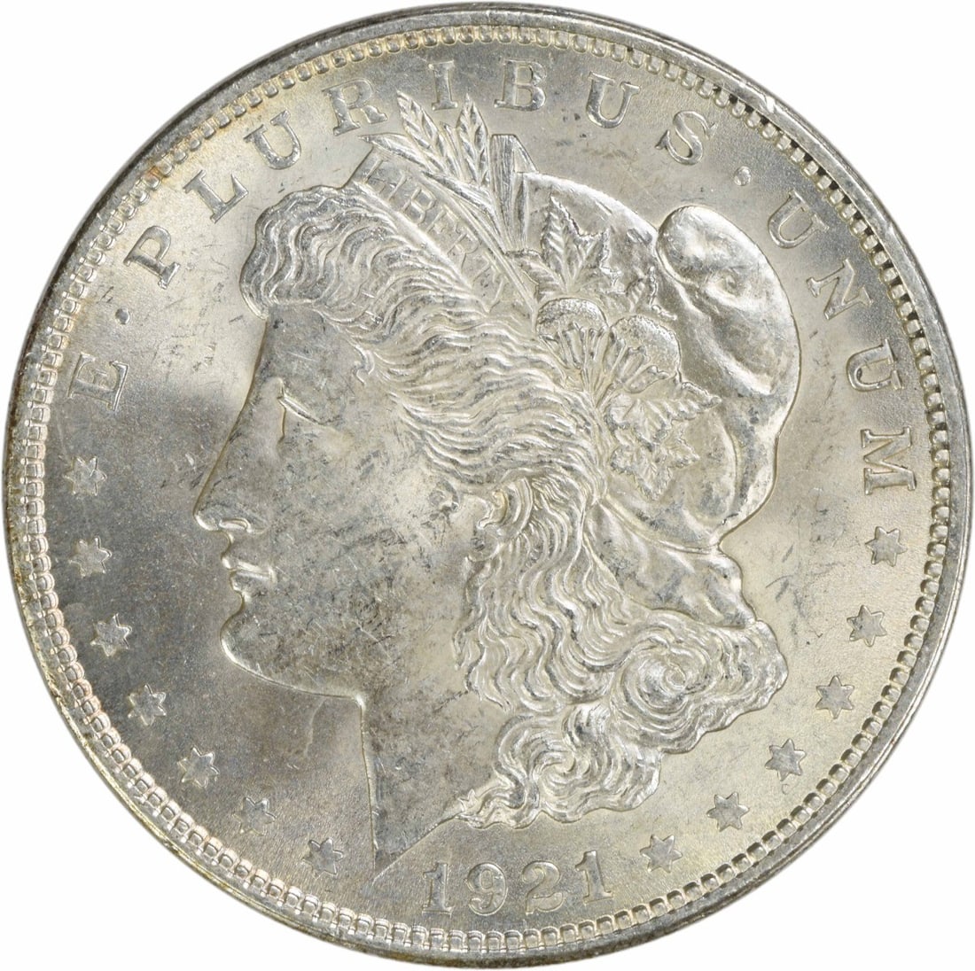 1921 Silver Morgan Dollar Brilliant Uncirculated Philadelphia Mint Uncertified: 1921 Silver Morgan Dollar Brilliant Uncirculated Philadelphia Mint Uncertified This is a 1921 Morgan Silver Dollar in Brilliant Uncirculated (BU) condition. It is uncertified and was produced without 