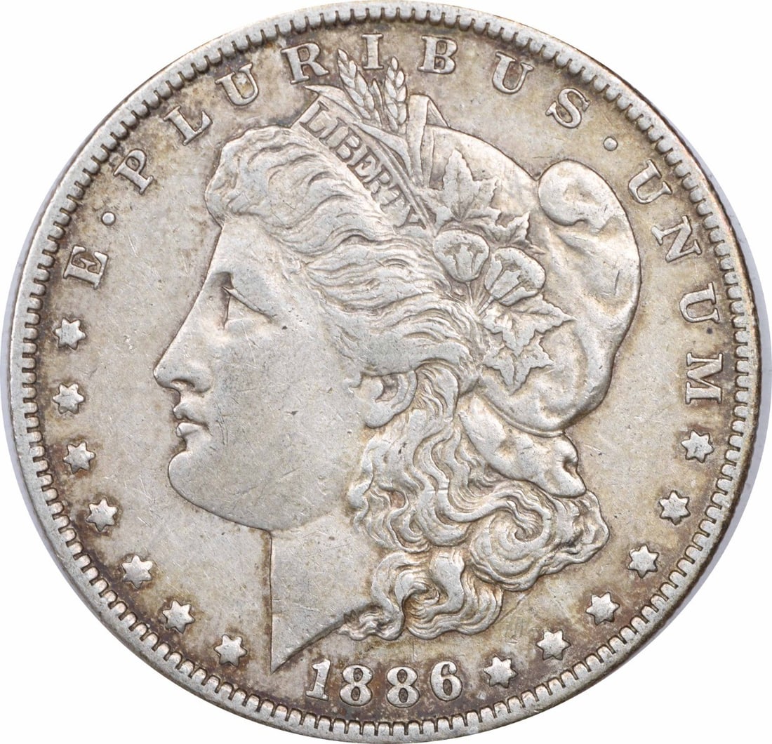 1886 O Morgan Dollar XF Uncertified New Orleans Mint: 1886 O Morgan Dollar XF Uncertified New Orleans Mint This 1886-O Morgan Silver Dollar is an ungraded, circulated coin from the New Orleans Mint. Composed of 90% silver and 10% copper, it features the 