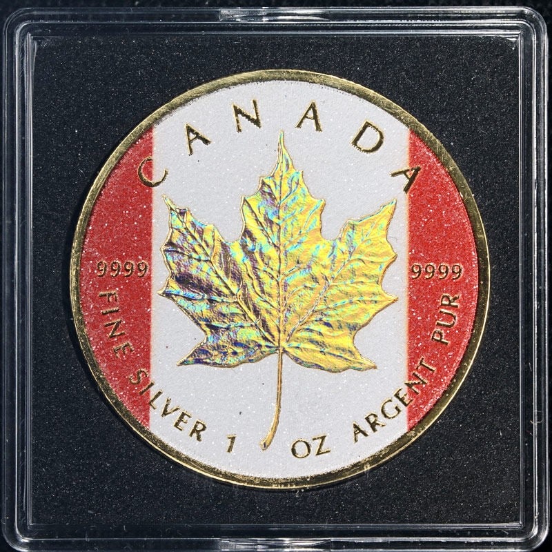 2025 Canada 1 Ounce Silver Maple Leaf Gold Holo Diamond Flag Edition: 2025 Canada 1 Ounce Silver Maple Leaf Gold Holo Diamond Flag Edition This stunning 2025 Canada 1 Ounce Silver Maple Leaf Gold Holo Diamond Flag Edition coin features superb eye appeal, boasting fantas