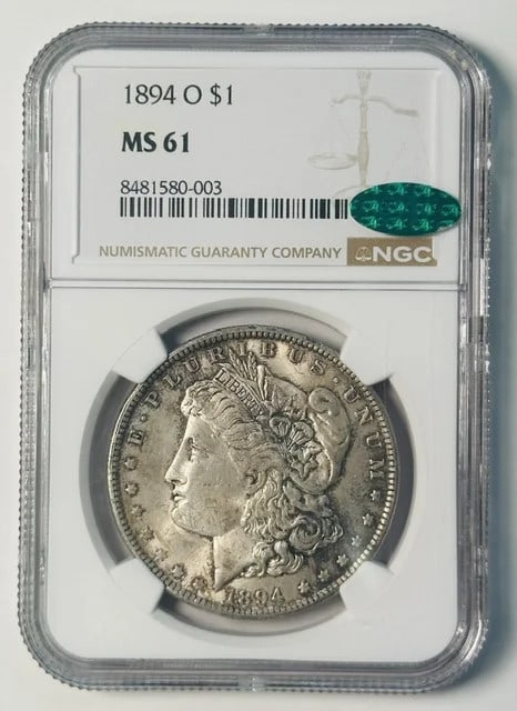 1894-O Morgan Dollar NGC MS61 CAC: 1894-O Morgan Dollar NGC MS61 CAC This 1894 Morgan Silver Dollar was minted in New Orleans and has been graded MS 61 by NGC. It also carries CAC approval, indicating quality within its grade. Composed