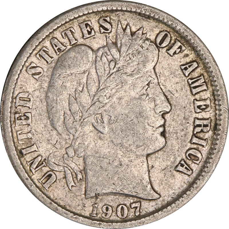 1907 New Orleans Silver Barber Dime in Circulated Condition: 1907 New Orleans Silver Barber Dime in Circulated Condition This 1907-O Barber Dime was minted in New Orleans and is composed of silver. It is a circulated coin from the United States, dating to 1907.