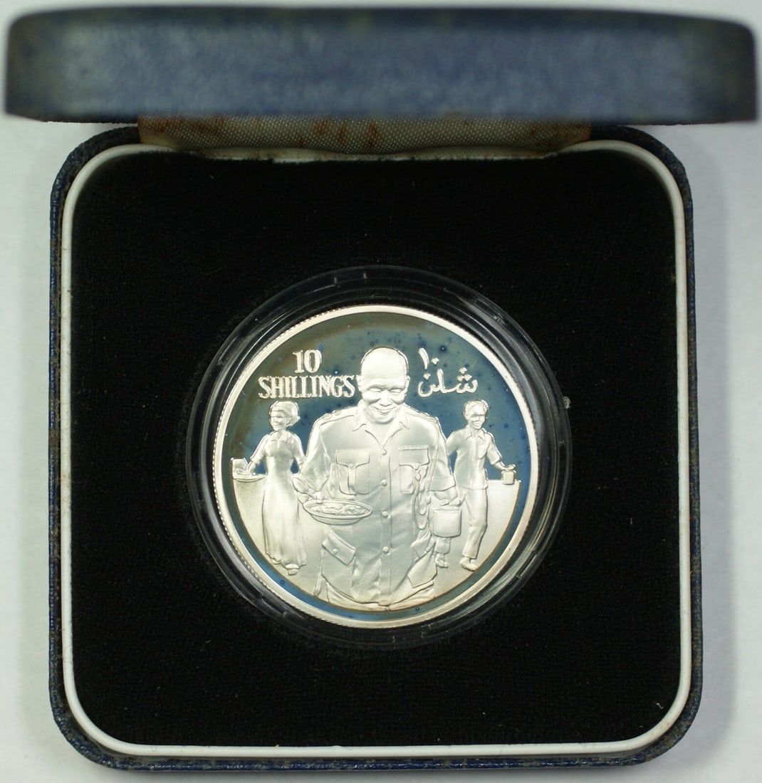 1979 Somalia Silver 10 Shillings Commemorative Coin in Government Case: 1979 Somalia Silver 10 Shillings Commemorative Coin in Government Case This is a 1979 Somalia 10 Shillings commemorative coin, issued to mark the 10th Anniversary of the Republic and featuring a 'Peop