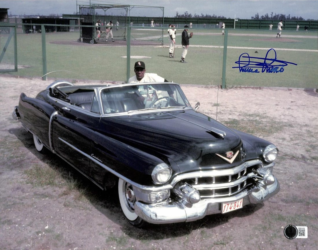 Signed 11x14 Minnie Minoso White Sox photo Beckett authenticated: Signed 11x14 Minnie Minoso White Sox photo Beckett authenticated This is a vibrant 11x14 inch color photograph featuring legendary baseball star Minnie Minoso with his classic Cadillac near a baseball