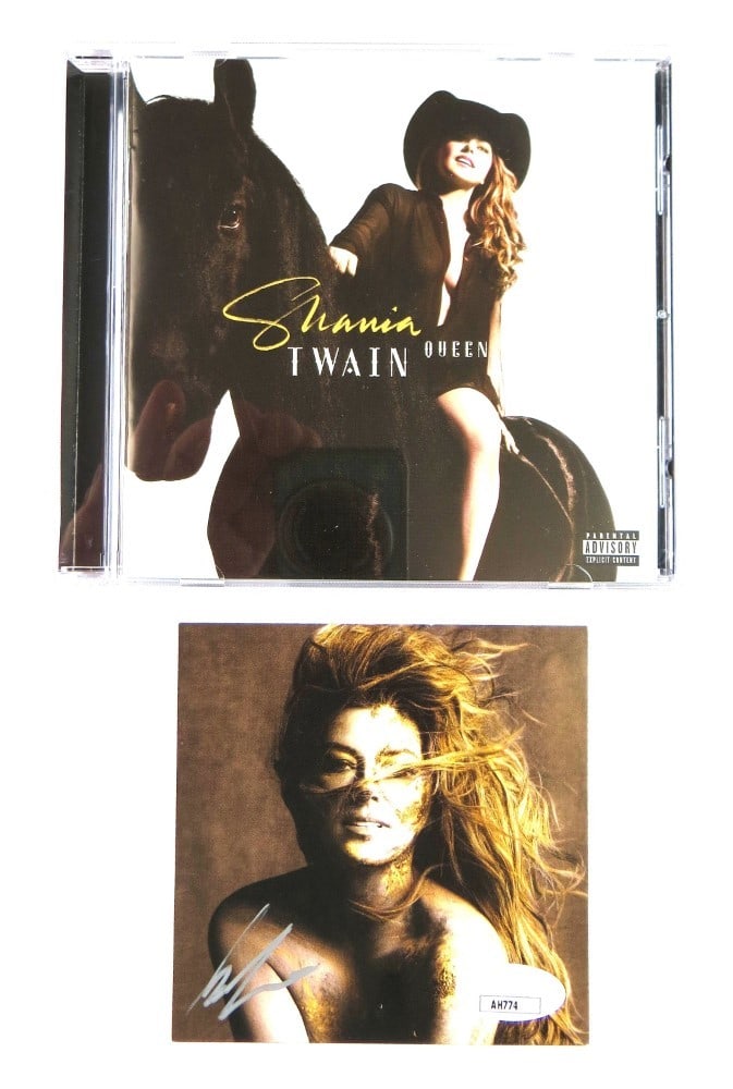 Autographed Shania Twain Queen of Me CD Insert with Disc JSA Authenticated: Autographed Shania Twain Queen of Me CD Insert with Disc JSA Authenticated This is an original Shania Twain autographed CD insert for "Queen of Me," accompanied by a new copy of the CD. The autograph 
