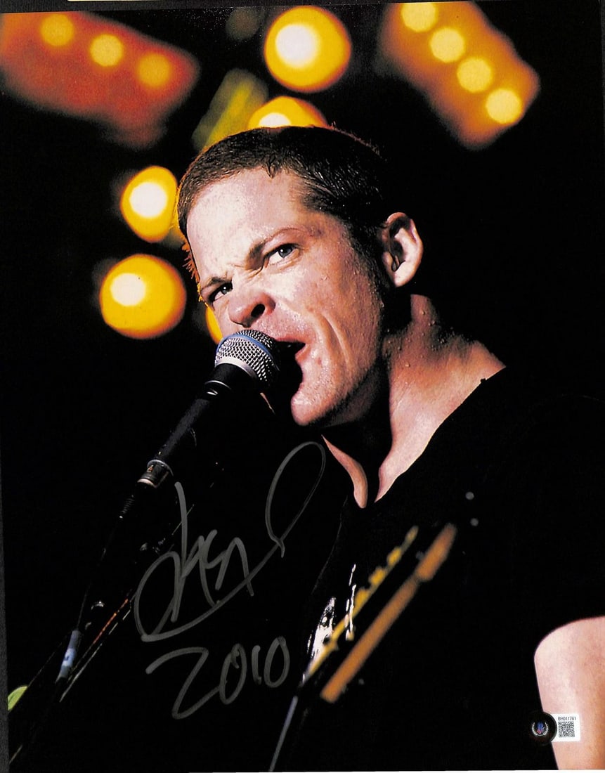 Beckett Certified Jason Newsted 11x14 Signed Photo: Beckett Certified Jason Newsted 11x14 Signed Photo This is an 11x14 photograph signed by Jason Newsted, renowned bassist of Metallica. The image features Newsted performing live and is hand-signed wit