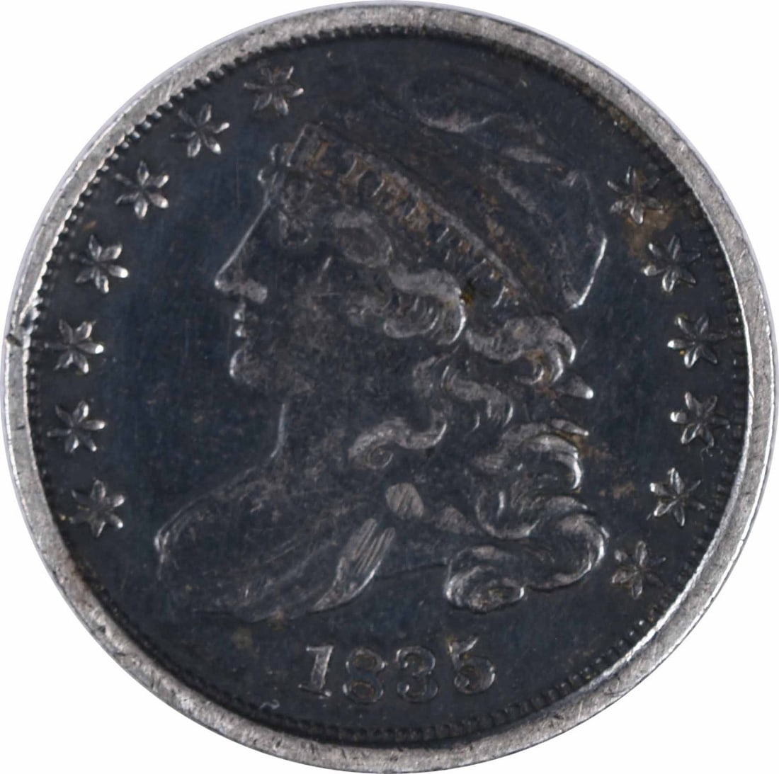 1835 Capped Bust Silver Dime VF Uncertified 10C Philadelphia: 1835 Capped Bust Silver Dime VF Uncertified 10C Philadelphia This 1835 Capped Bust Silver Dime is a circulated coin featuring a design by John Reich. It is composed of 89.2% silver and 10.8% copper, r