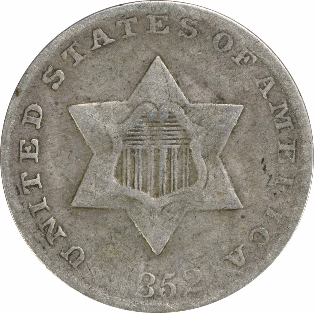 1852 United States Three Cent Piece Silver Circulated F Grade Uncertified: 1852 United States Three Cent Piece Silver Circulated F Grade Uncertified This is an 1852 Three Cent Silver coin from the United States, minted in Philadelphia. The coin is circulated, uncertified, an