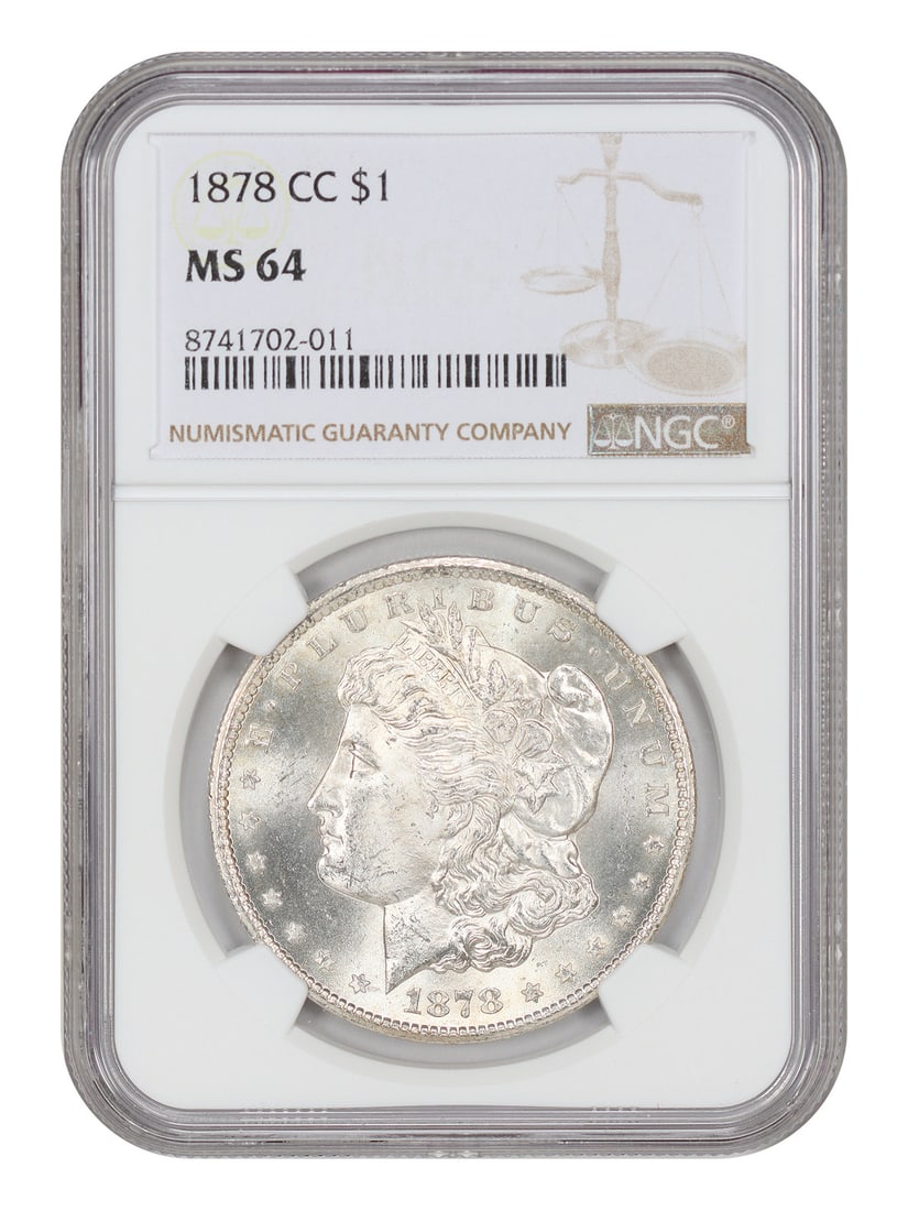 1878 Carson City Morgan Dollar NGC MS64 First Year: 1878 Carson City Morgan Dollar NGC MS64 First Year This 1878-CC Morgan Dollar is a highly regarded first-year issue from the Carson City Mint. Certified by NGC and in pre-owned condition, it is a nota