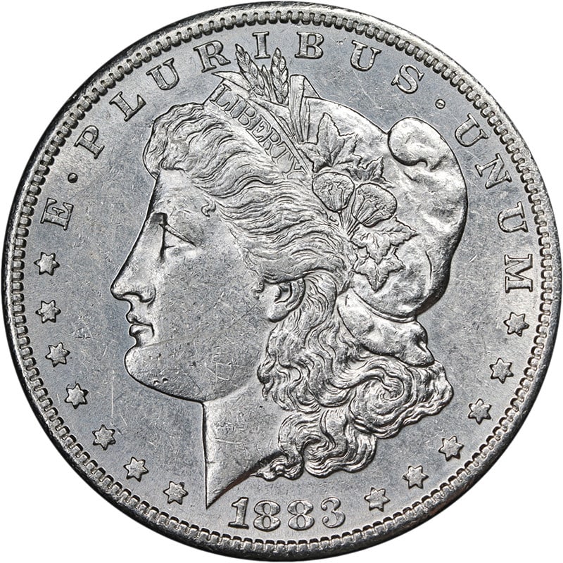 1883-S Morgan Silver Dollar AU BU Bright White: 1883-S Morgan Silver Dollar AU BU Bright White This 1883-S Morgan Silver Dollar offers attractive eye appeal, strong luster, and a well-defined strike. The coin displays bright white color and pleasin