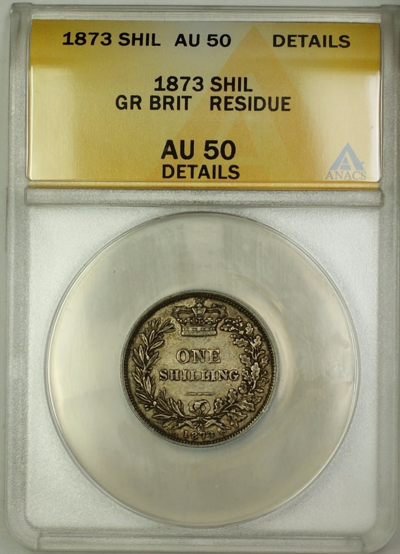 1873 United Kingdom Shilling Silver Coin ANACS AU 50 Details: 1873 United Kingdom Shilling Silver Coin ANACS AU 50 Details This is an 1873 Die 72 Great Britain shilling coin composed of silver. The coin is certified by ANACS with a grade of AU-50 Details and is 