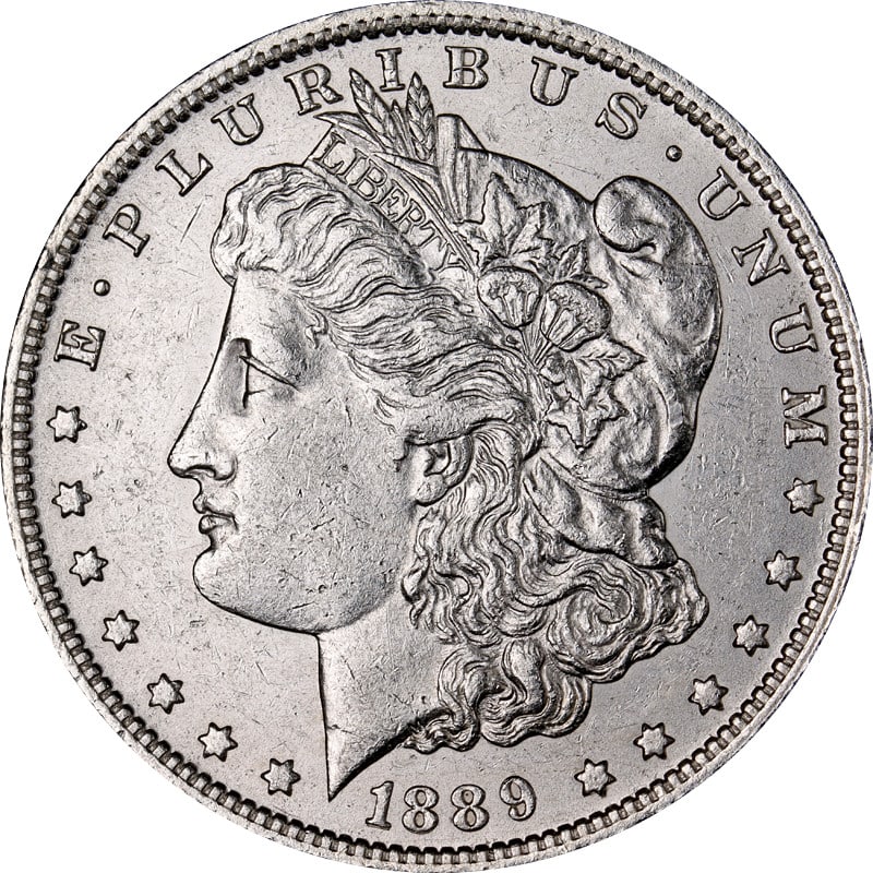 Silver Dollar Coin 1889 New Orleans Mint Morgan Series: Silver Dollar Coin 1889 New Orleans Mint Morgan Series This is an 1889-O Morgan Silver Dollar minted in New Orleans. The coin is composed of 90% silver and is in circulated, pre-owned condition. It is