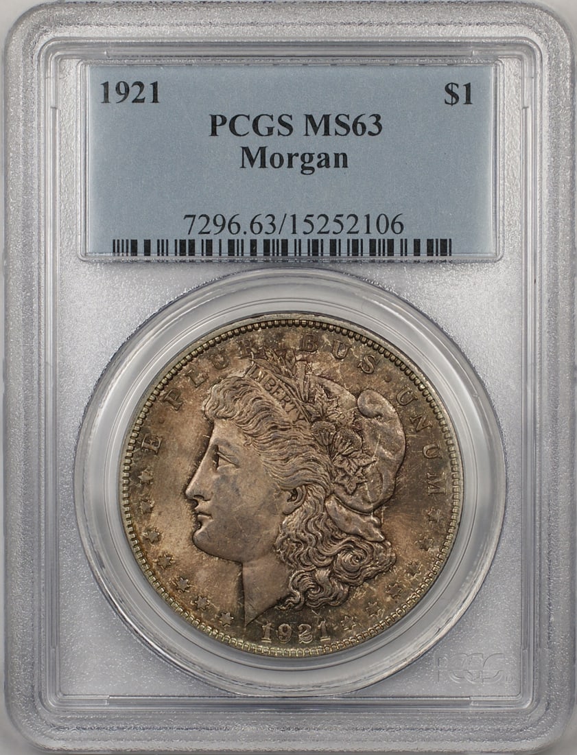 PCGS MS 63 1921 Silver Morgan Dollar Philadelphia Toned Uncirculated: PCGS MS 63 1921 Silver Morgan Dollar Philadelphia Toned Uncirculated This 1921 Morgan Silver Dollar features a $1 denomination and is composed of silver. Certified by PCGS with a grade of MS-63, this 