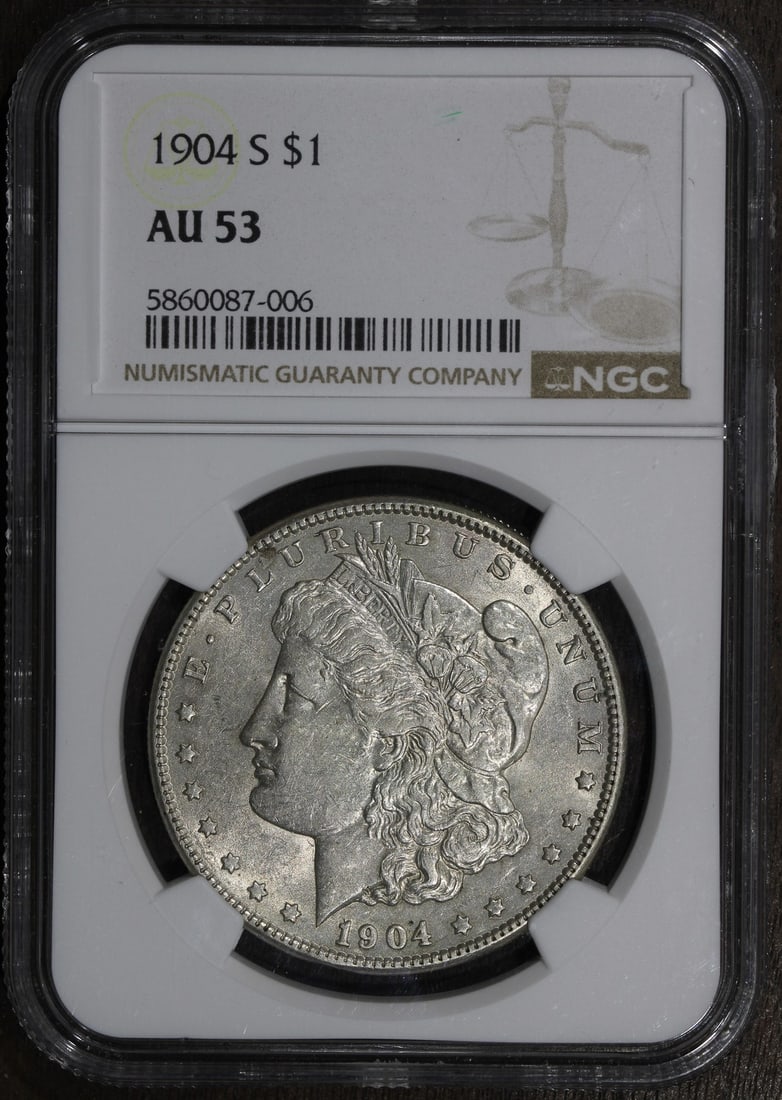 NGC AU53 1904-S Morgan Silver Dollar Key Date: NGC AU53 1904-S Morgan Silver Dollar Key Date This is a 1904 Morgan Silver Dollar graded AU53 by NGC. Minted in San Francisco, this circulated coin is composed of 90% silver and represents a key date 