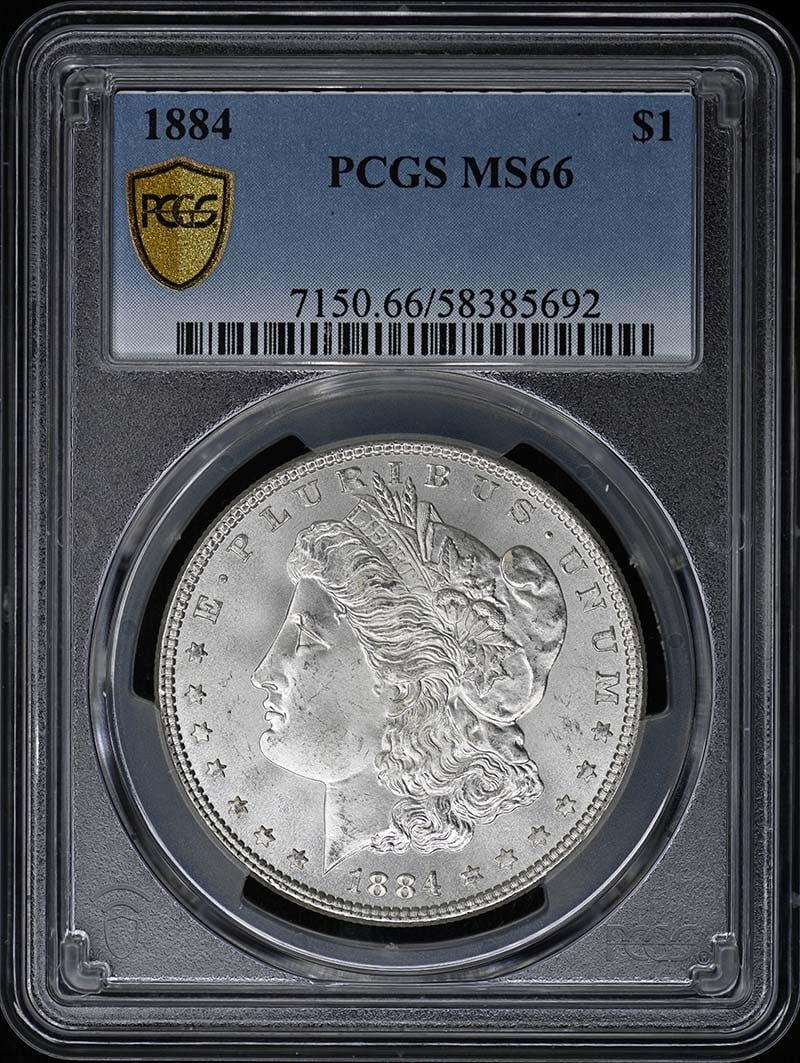 PCGS MS66 1884 Morgan Silver Dollar: PCGS MS66 1884 Morgan Silver Dollar This 1884 Morgan Dollar is graded MS66 by PCGS, indicating a high-quality, uncirculated coin. Minted in Philadelphia, it represents a classic piece of United States