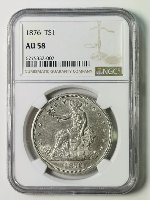 NGC AU-58 1876 Trade Dollar Silver: NGC AU-58 1876 Trade Dollar Silver This 1876 Trade Dollar is composed of silver and has been certified by NGC with a grade of AU 58. It is a pre-owned coin from the United States, offering collectors 