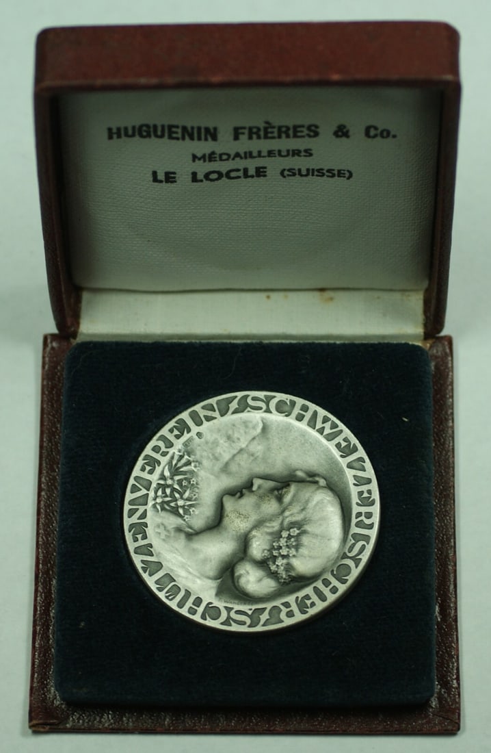 1921 Swiss Silver Shooting Medal R1970 by Huguenin Freres with Case: 1921 Swiss Silver Shooting Medal R1970 by Huguenin Freres with Case This is a 1921 Switzerland Silver Swiss Shooting Medal, issued by Huguenin Freres. The medal is uncirculated and comes in its origin