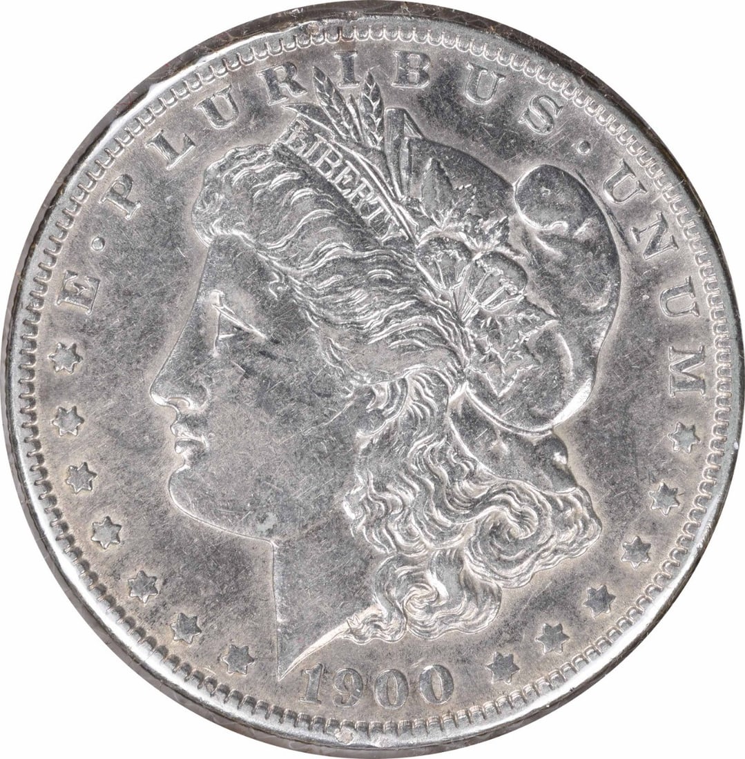 1900-O Morgan Silver Dollar Uncertified 90% Silver Coin: 1900-O Morgan Silver Dollar Uncertified 90% Silver Coin This 1900-O/CC Morgan Silver Dollar is a stunning example of American coinage. Featuring a design by George T. Morgan, this coin boasts a grade 
