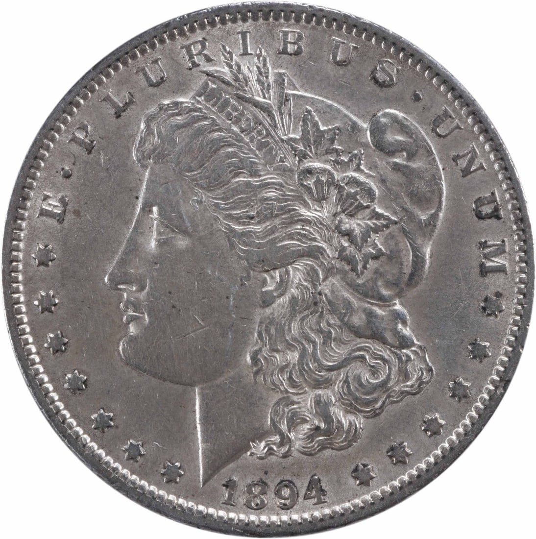 1894 Philadelphia Morgan Dollar AU Grade Uncertified 90 Percent Silver Coin: 1894 Philadelphia Morgan Dollar AU Grade Uncertified 90 Percent Silver Coin This is an 1894 Morgan Silver Dollar from the United States, struck at the Philadelphia Mint with no mint mark. The coin is 