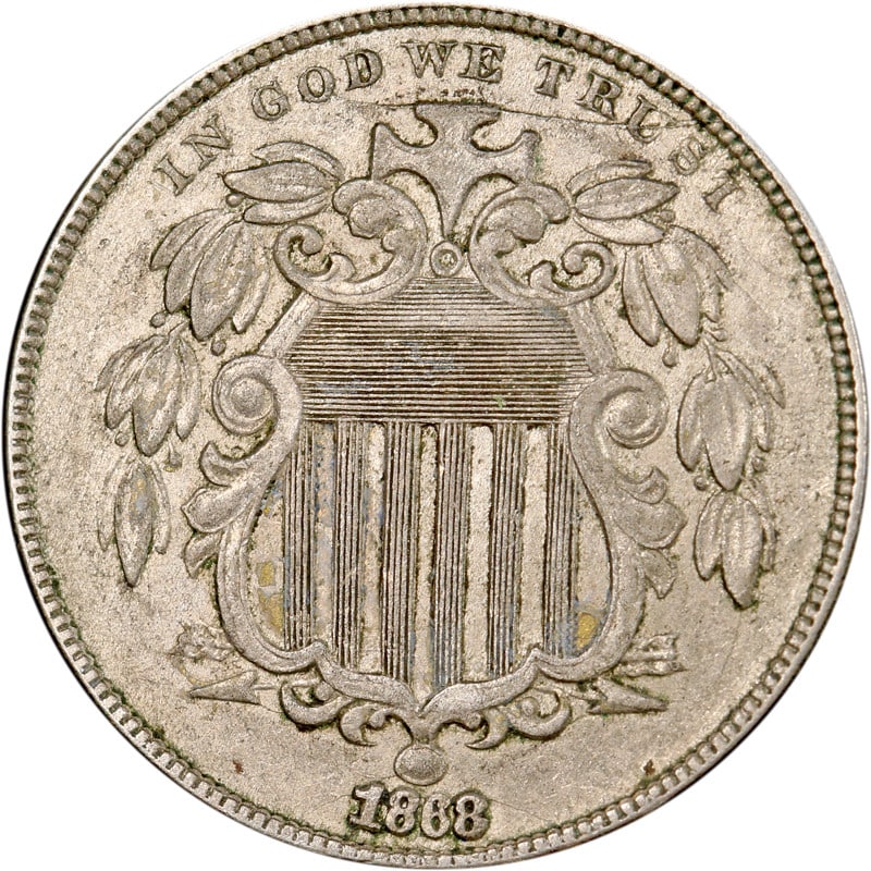 1868 United States Shield Nickel Circulated Vintage Coin: 1868 United States Shield Nickel Circulated Vintage Coin This is an 1868 Shield Nickel from the United States. The coin is composed of nickel and has been circulated. It is uncertified and is offered 