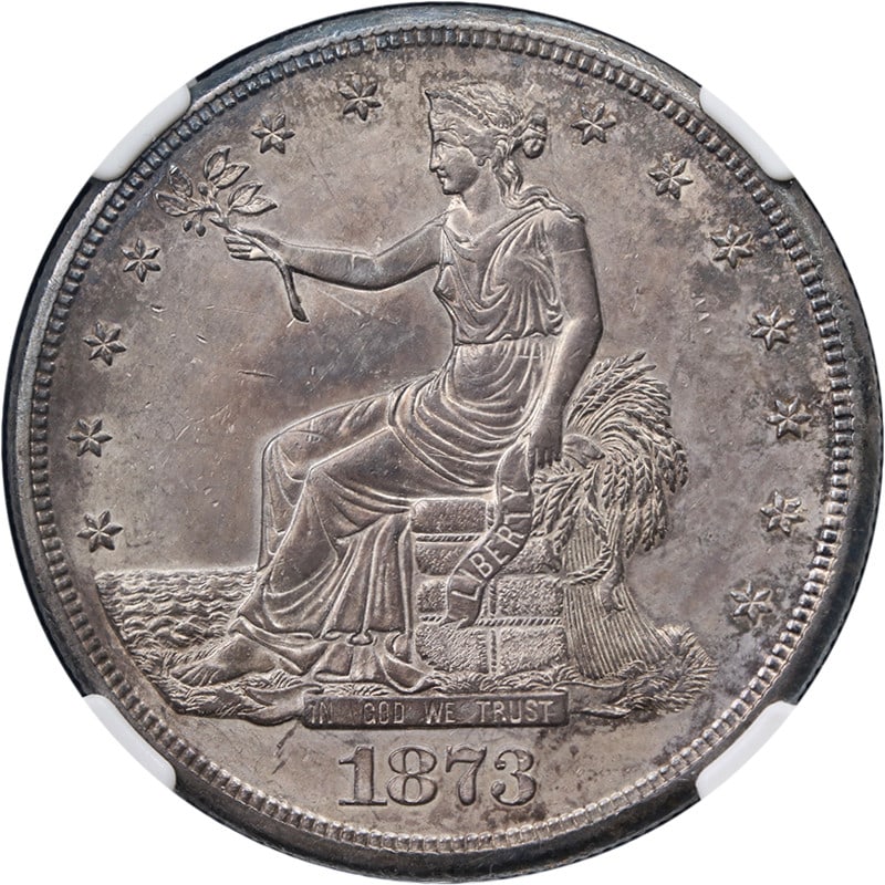 1873-CC Silver Trade Dollar NGC MS61 Key Date: 1873-CC Silver Trade Dollar NGC MS61 Key Date This 1873-CC Trade Dollar is graded MS61 by NGC and features strong eye appeal with a sharp strike. The coin displays attractive color and surfaces, with 