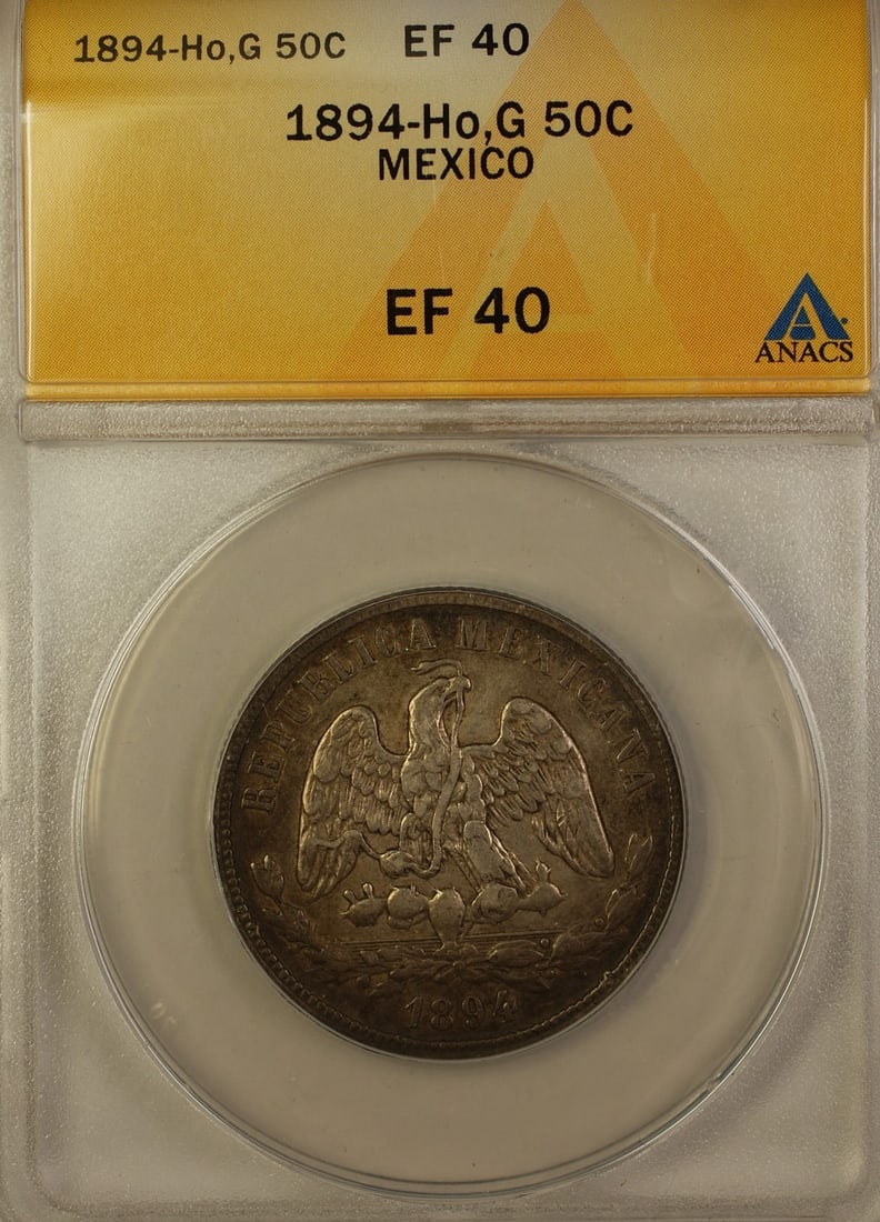1894 Mexico 50 Cents Silver Coin ANACS EF-40: 1894 Mexico 50 Cents Silver Coin ANACS EF-40 This is an 1894 50 cent silver coin from Mexico, issued during the Second Republic period (1867-1905). The coin is composed of 0.903 fine silver and has be