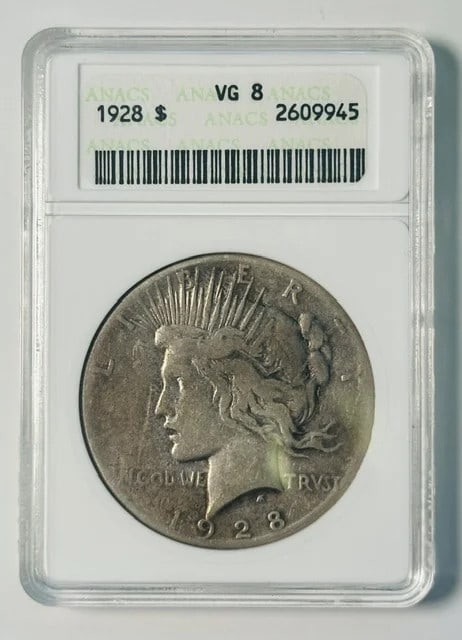 1928 Philadelphia Peace Dollar ANACS VG-8 Silver: 1928 Philadelphia Peace Dollar ANACS VG-8 Silver This is a 1928 Peace Dollar minted in Philadelphia, graded VG-8 by ANACS. The coin is composed of silver and comes with ANACS certification. It is a pr