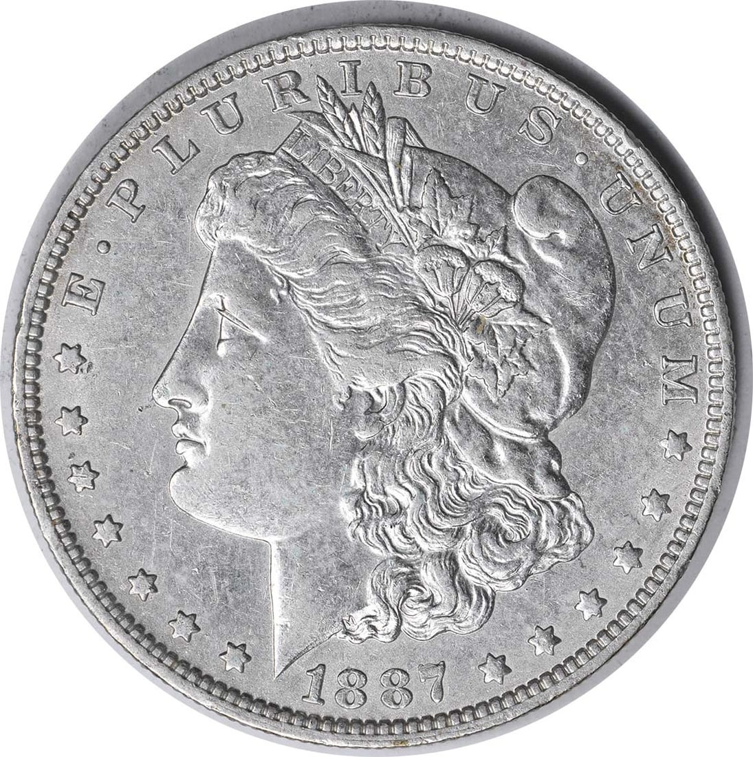 1887 Morgan Silver Dollar New Orleans Mint O Mint Mark XF: 1887 Morgan Silver Dollar New Orleans Mint O Mint Mark XF The 1887/6-O VAM 3 Morgan Silver Dollar is a notable piece featuring the distinguished design by George T. Morgan. This coin is made of 90% si