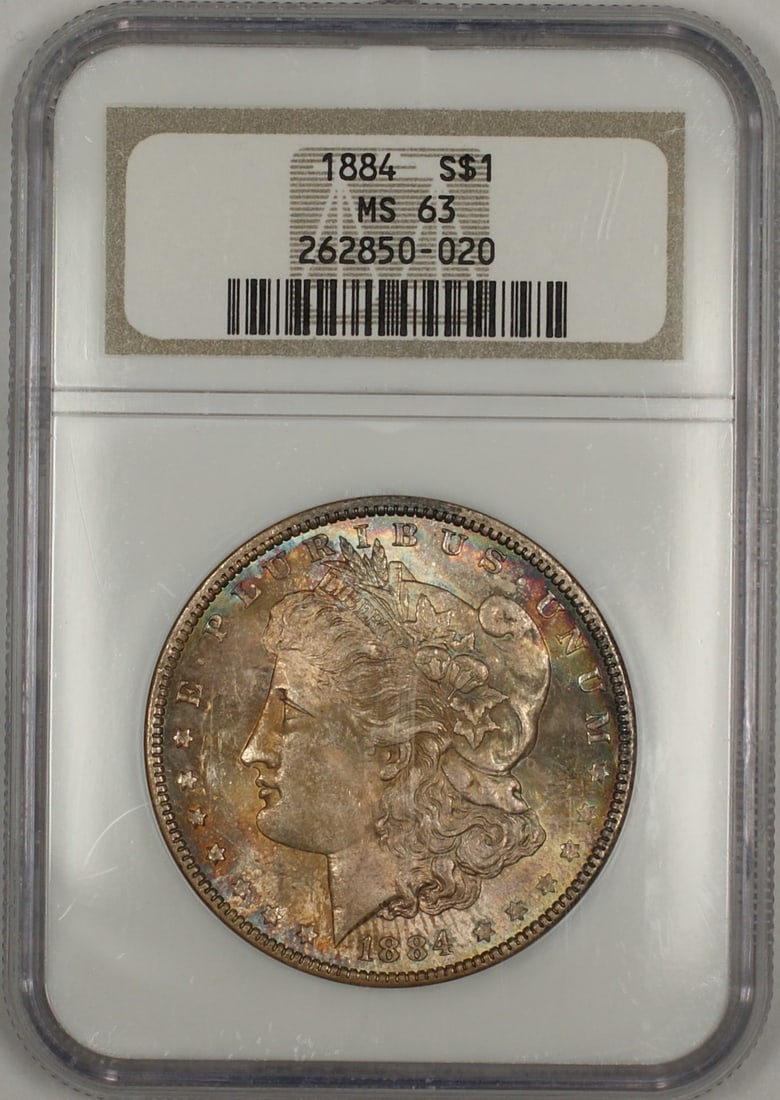 NGC MS-63 1884 Silver Morgan Dollar with Attractive Obverse Toning: NGC MS-63 1884 Silver Morgan Dollar with Attractive Obverse Toning This is an 1884 Morgan Silver Dollar $1 coin certified by NGC with a grade of MS 63. The coin features a nicely toned obverse and was