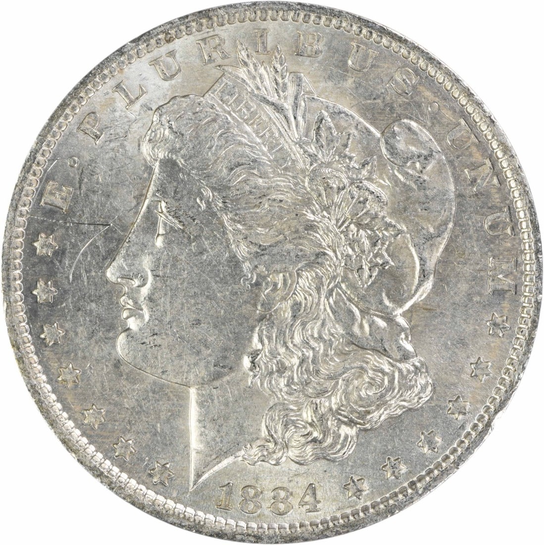 1884 O Morgan $1 Silver Dollar AU Uncertified: 1884 O Morgan $1 Silver Dollar AU Uncertified This 1884-O Morgan Silver Dollar is an attractive example of this classic United States coin. Struck with a composition of 90% silver and 10% copper, it f