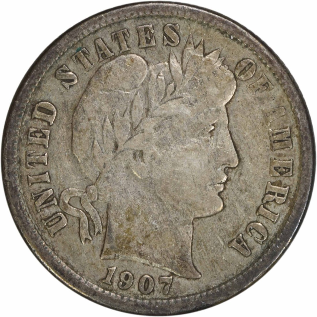 1907-O Barber Dime 10C VF Uncertified 90% Silver Coin: 1907-O Barber Dime 10C VF Uncertified 90% Silver Coin This 1907-O Barber Silver Dime is a classic piece of American numismatics, featuring the iconic design by Charles E. Barber. It has been circulate