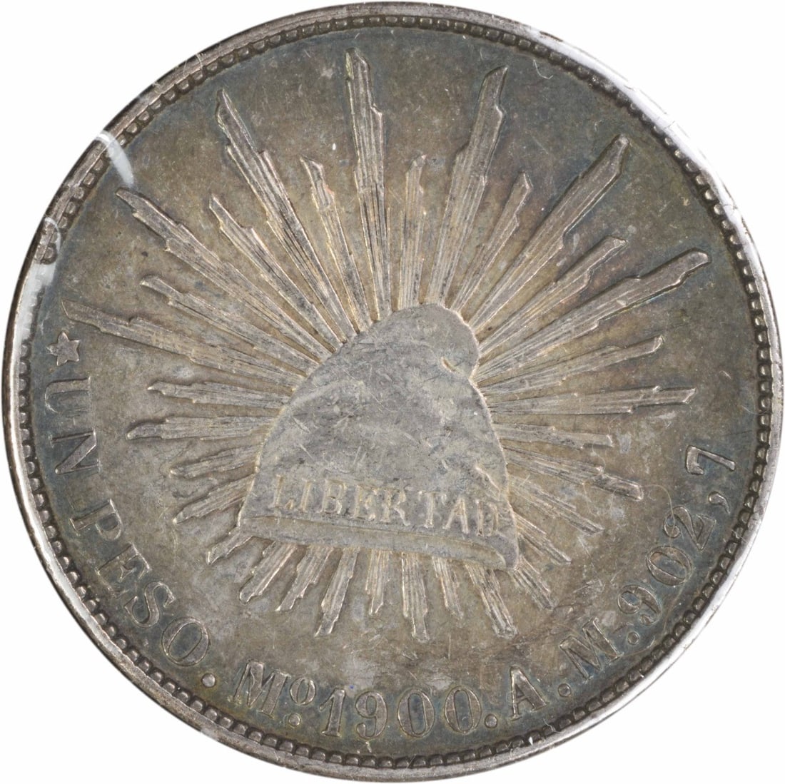 Mexico 1900 1 Peso KM409.2 EF Silver Coin Uncertified: Mexico 1900 1 Peso KM409.2 EF Silver Coin Uncertified This 1900 Mo AM Mexico 1 Peso coin is a circulated example with a grade of EF (Extremely Fine). It is uncertified and features the KM number 409.2