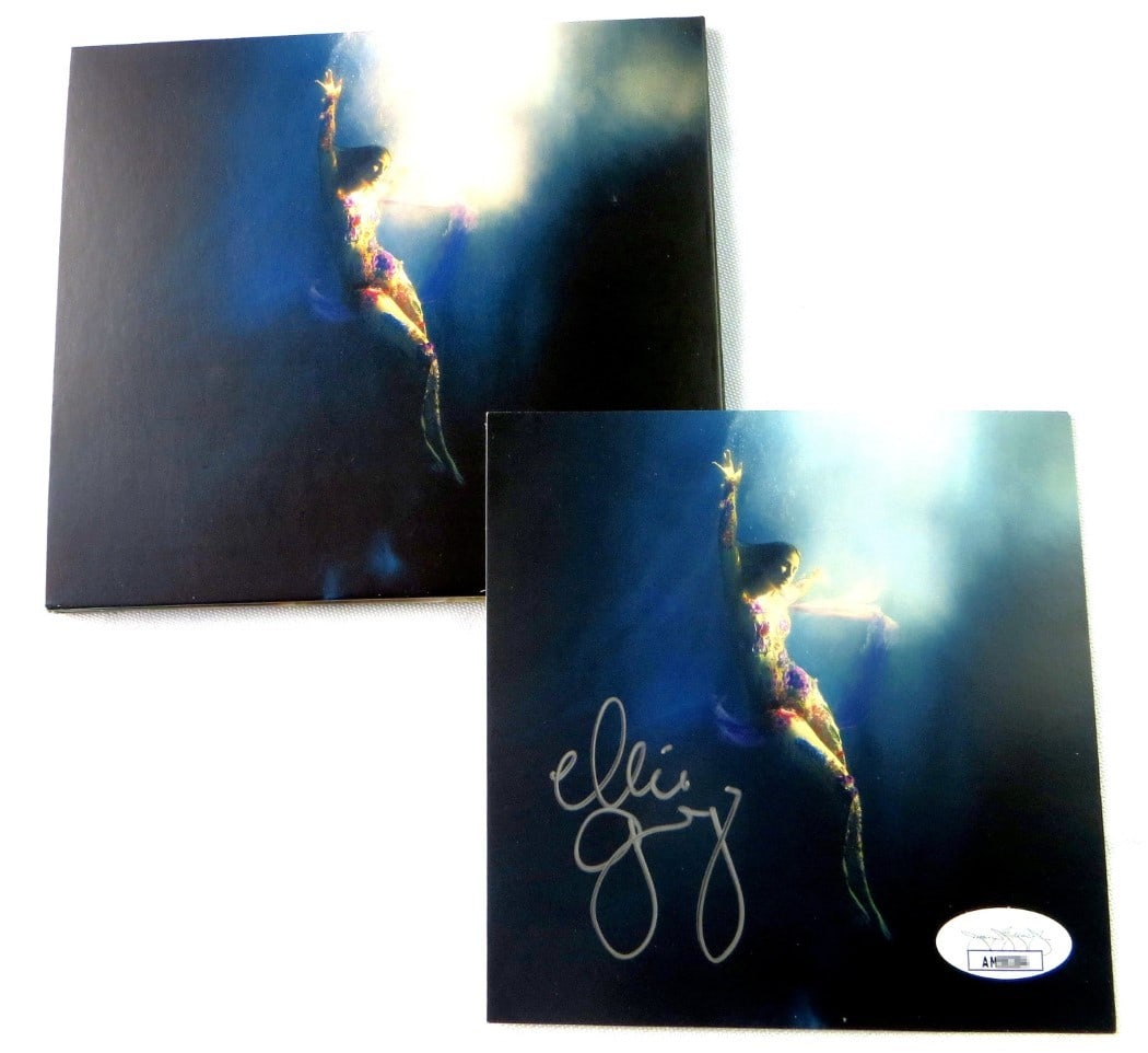 Ellie Goulding JSA Authenticated Signed Higher Than Heaven CD Insert with Disc: Ellie Goulding JSA Authenticated Signed Higher Than Heaven CD Insert with Disc This listing features an original CD and booklet for "Higher than Heaven," autographed by Ellie Goulding. The included CD
