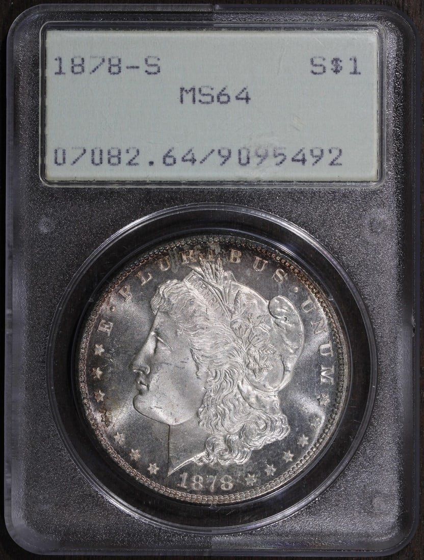 PCGS OGH Rattler 1878-S Morgan Silver Dollar MS64: PCGS OGH Rattler 1878-S Morgan Silver Dollar MS64 This is a 1878 Morgan Silver Dollar, minted in San Francisco and graded MS64 by PCGS in an OGH Rattler holder. The coin is composed of 0.9 fine silver