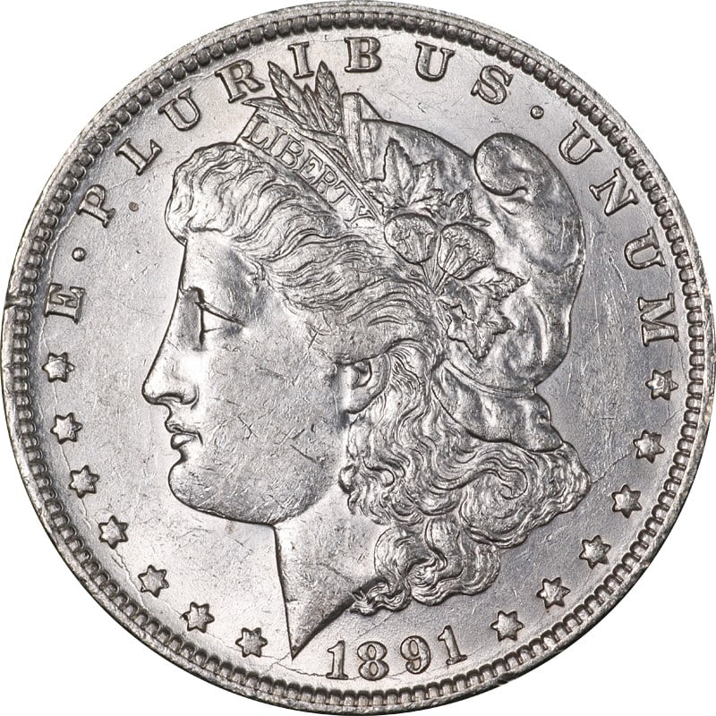 1891 New Orleans Morgan dollar with die cracks: 1891 New Orleans Morgan dollar with die cracks This 1891-O Morgan Silver Dollar is a circulated coin from the New Orleans Mint. Composed of 90% silver, it features multiple die cracks, adding unique c