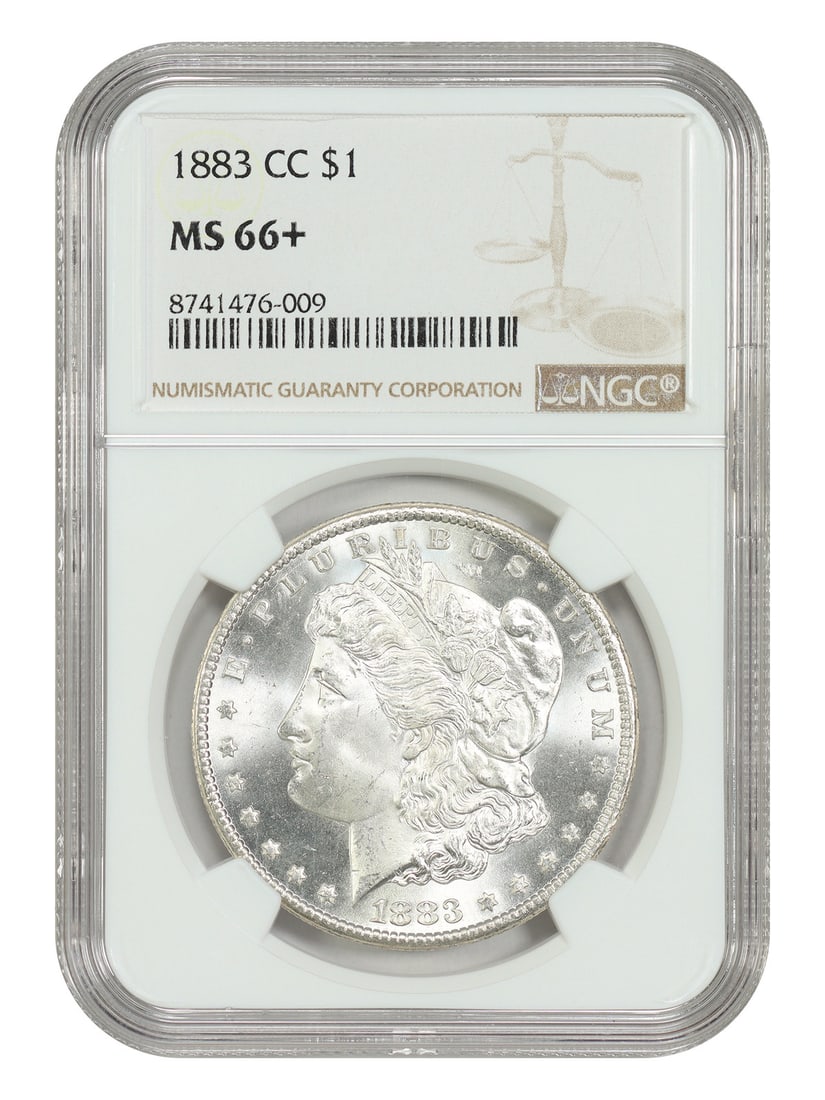 NGC MS66 Plus 1883 CC Morgan Silver Dollar: NGC MS66 Plus 1883 CC Morgan Silver Dollar This 1883-CC Morgan Dollar is graded MS66+ by NGC and is a sought-after Carson City Mint issue. The coin is uncirculated, showcasing a mostly white appearanc