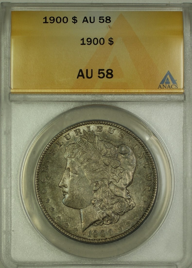 ANACS AU58 1900 Morgan Dollar New Orleans Mint: ANACS AU58 1900 Morgan Dollar New Orleans Mint This 1900 Morgan Silver Dollar features a $1 denomination and is composed of silver. Graded AU-58 by ANACS, it originates from the New Orleans mint and d