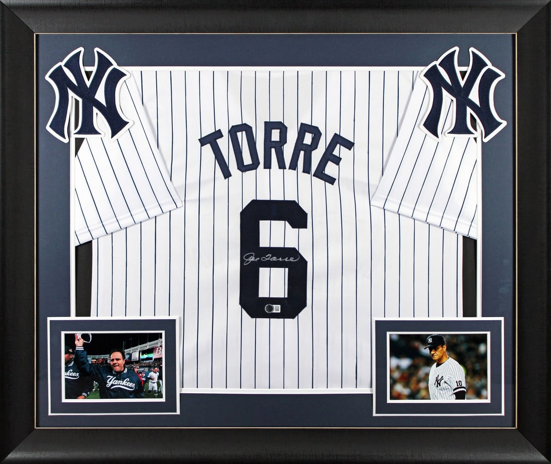 Joe Torre Signed Framed Jersey New York Yankees BAS Witnessed: Joe Torre Signed Framed Jersey New York Yankees BAS Witnessed This exquisite Framed Jersey features a white pinstripe design and has been personally signed by Joe Torre, the legendary player of the Ne