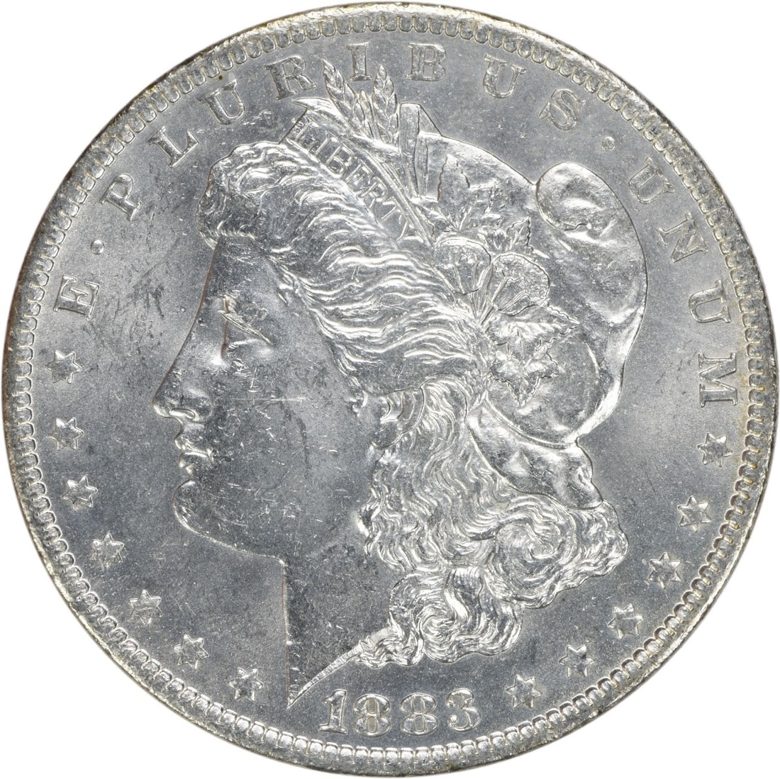 Uncirculated 1883 O Morgan Silver Dollar BU Grade Uncertified: Uncirculated 1883 O Morgan Silver Dollar BU Grade Uncertified This 1883-O Morgan Silver Dollar is an uncirculated coin from the New Orleans Mint. Composed of silver, it features the classic Morgan des