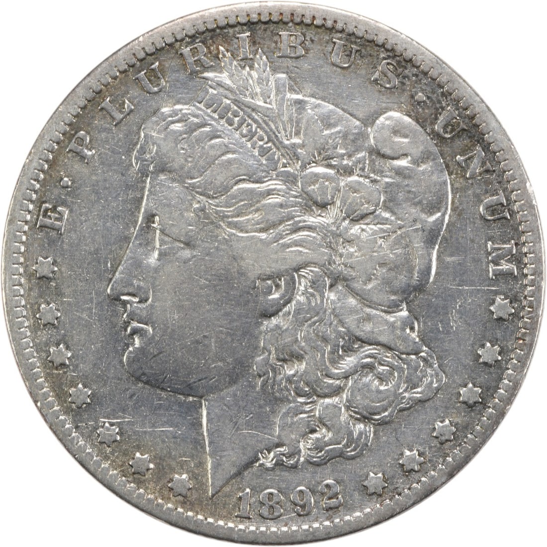 1892 San Francisco Morgan Dollar VF Grade Uncertified Silver Coin: 1892 San Francisco Morgan Dollar VF Grade Uncertified Silver Coin This 1892-S Morgan Silver Dollar is a circulated coin graded as Very Fine (VF). It is composed of 90% silver and 10% copper, with a de