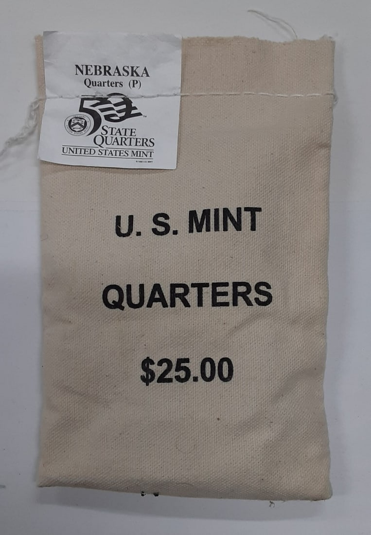Nebraska 2006 P quarter 100 coin U.S. Mint bag $25 face value: Nebraska 2006 P quarter 100 coin U.S. Mint bag $25 face value This is a 2006 Nebraska State Quarter bag containing 100 uncirculated 25-cent coins, each minted at the Philadelphia Mint. The coins are m