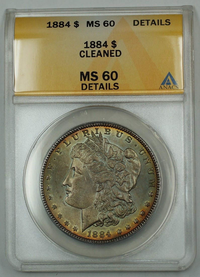 ANACS MS-60 Details 1884 Silver Morgan Dollar Cleaned Toned Philadelphia Mint: ANACS MS-60 Details 1884 Silver Morgan Dollar Cleaned Toned Philadelphia Mint This is an 1884 Morgan Silver Dollar coin certified by ANACS with a grade of MS-60 Details. The coin is uncirculated, has 
