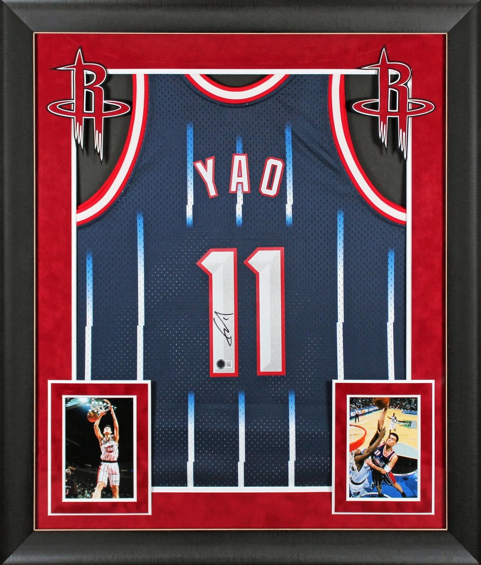 Yao Ming Signed Blue Rockets Framed Mitchell & Ness Jersey BAS Witnessed: Yao Ming Signed Blue Rockets Framed Mitchell & Ness Jersey BAS Witnessed This authentic Houston Rockets jersey, featuring the iconic blue color, has been personally signed by NBA superstar Yao Ming. C