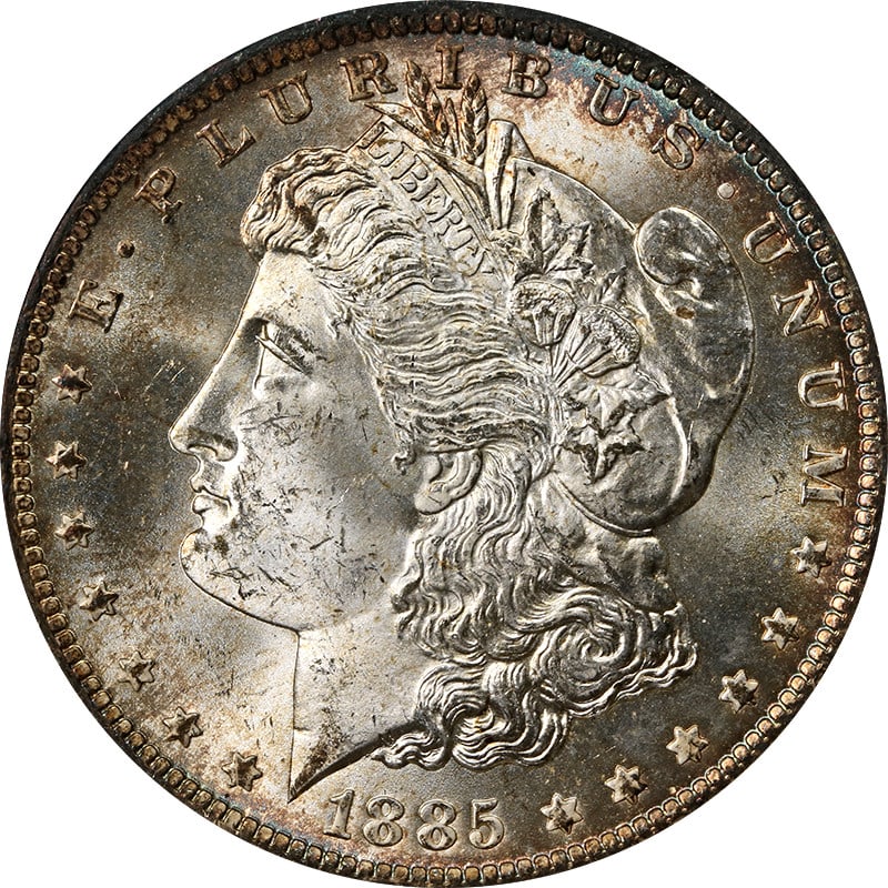 1885 O Morgan Dollar NGC MS64 Toned Silver: 1885 O Morgan Dollar NGC MS64 Toned Silver This 1885-O Morgan Silver Dollar is graded MS64 by NGC and features attractive toning. Struck in silver with a fineness of 0.9, this uncirculated coin was mi