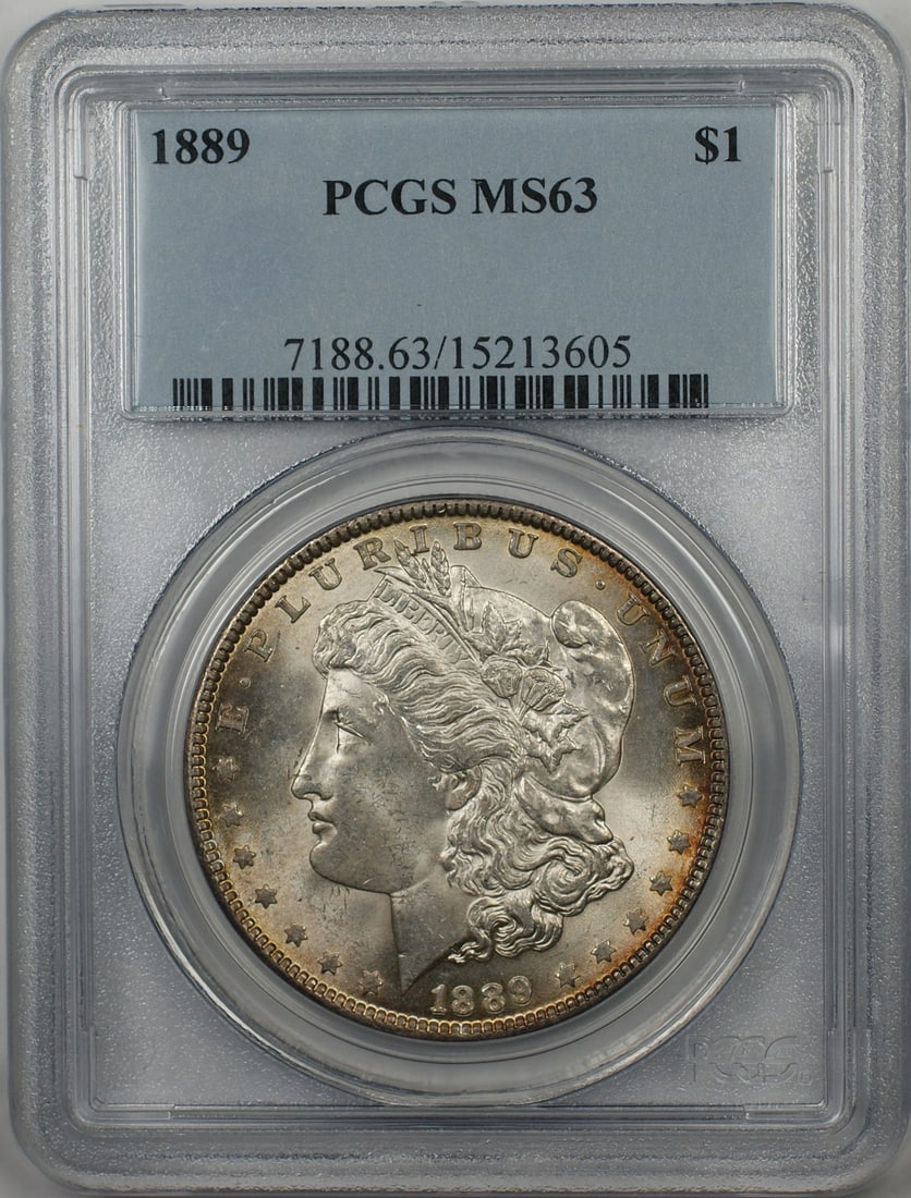 PCGS MS63 1889 Morgan Dollar Silver Coin With Light Toning: PCGS MS63 1889 Morgan Dollar Silver Coin With Light Toning This 1889 Morgan Silver Dollar is certified by PCGS with a grade of MS-63, indicating an uncirculated condition. Featuring light toning, this