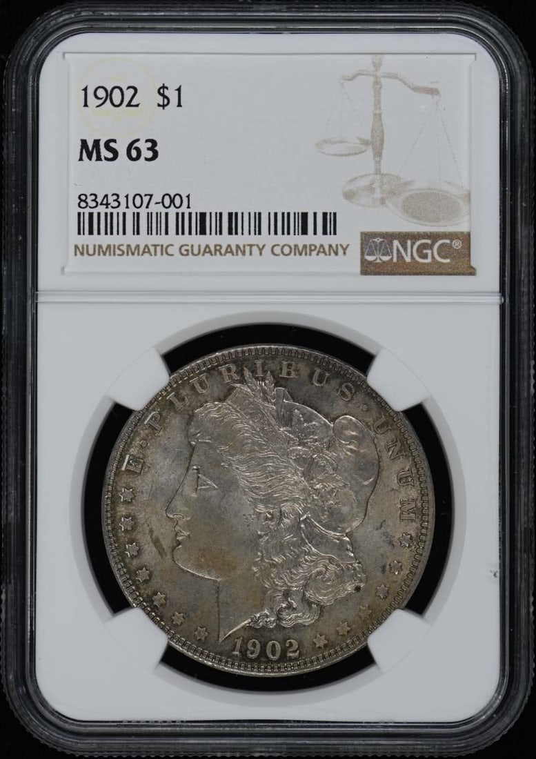 1902 Morgan Silver Dollar NGC MS63 Philadelphia: 1902 Morgan Silver Dollar NGC MS63 Philadelphia This 1902 Morgan Dollar is certified by NGC with a grade of MS63, indicating it is an uncirculated coin. Minted in Philadelphia, this pre-owned coin is 