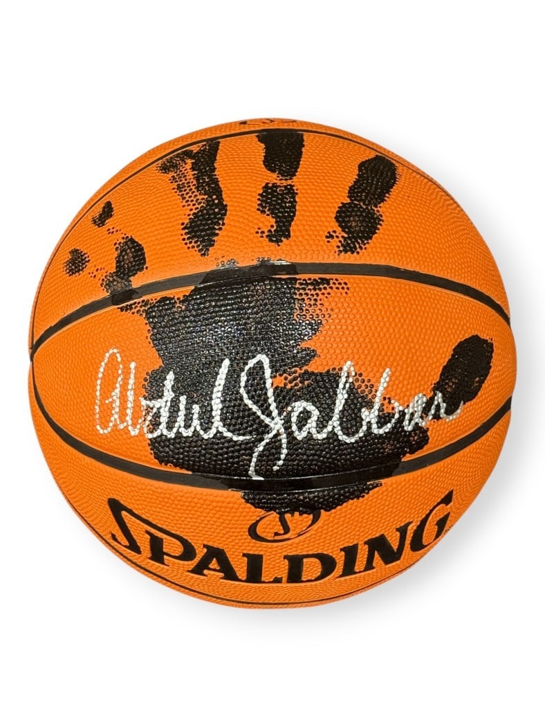 Autographed Kareem Abdul-Jabbar Lakers Basketball With Handprint Stand PSA Authenticated: Autographed Kareem Abdul-Jabbar Lakers Basketball With Handprint Stand PSA Authenticated This is an original basketball autographed by Kareem Abdul-Jabbar, featuring his actual hand print. The ball co