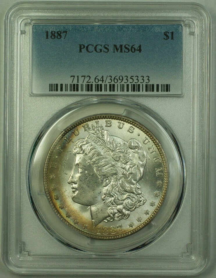 PCGS MS-64 1887 Morgan Dollar Toned Silver Coin: PCGS MS-64 1887 Morgan Dollar Toned Silver Coin This 1887 Morgan Silver Dollar is an uncirculated coin graded MS-64 by PCGS. It features attractive toning and was minted in Philadelphia. The coin is c